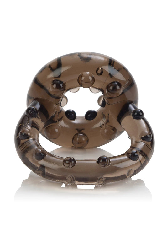 Doorzichtige bruine ring met ronde noppen rond open middel