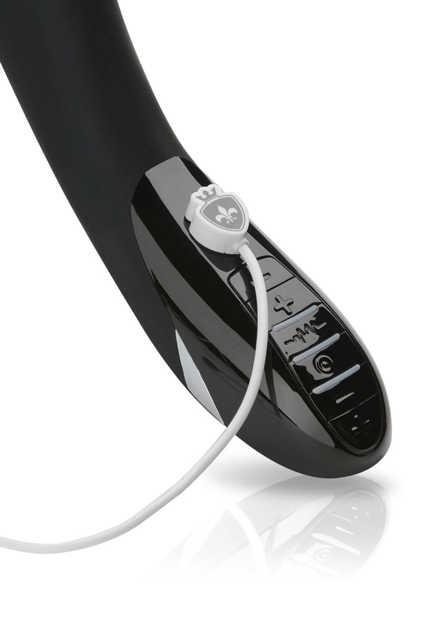Zwarte vibrator met kabel aangesloten op het bedieningspaneel.