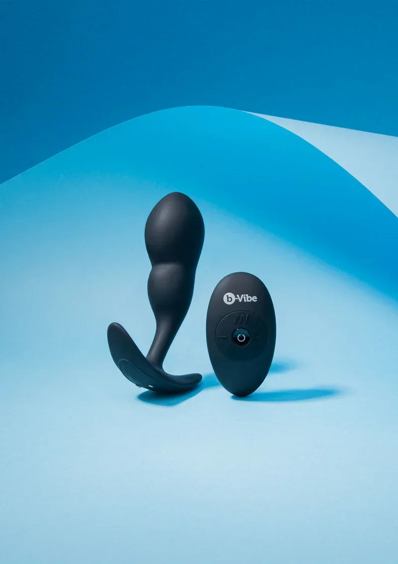 Remote Control P-Spot Snug Plug 145g by B-Vibe - Happytoys Sexshop: online sex shop for Feeling Happy & Easy 😊 - Discreet geleverd