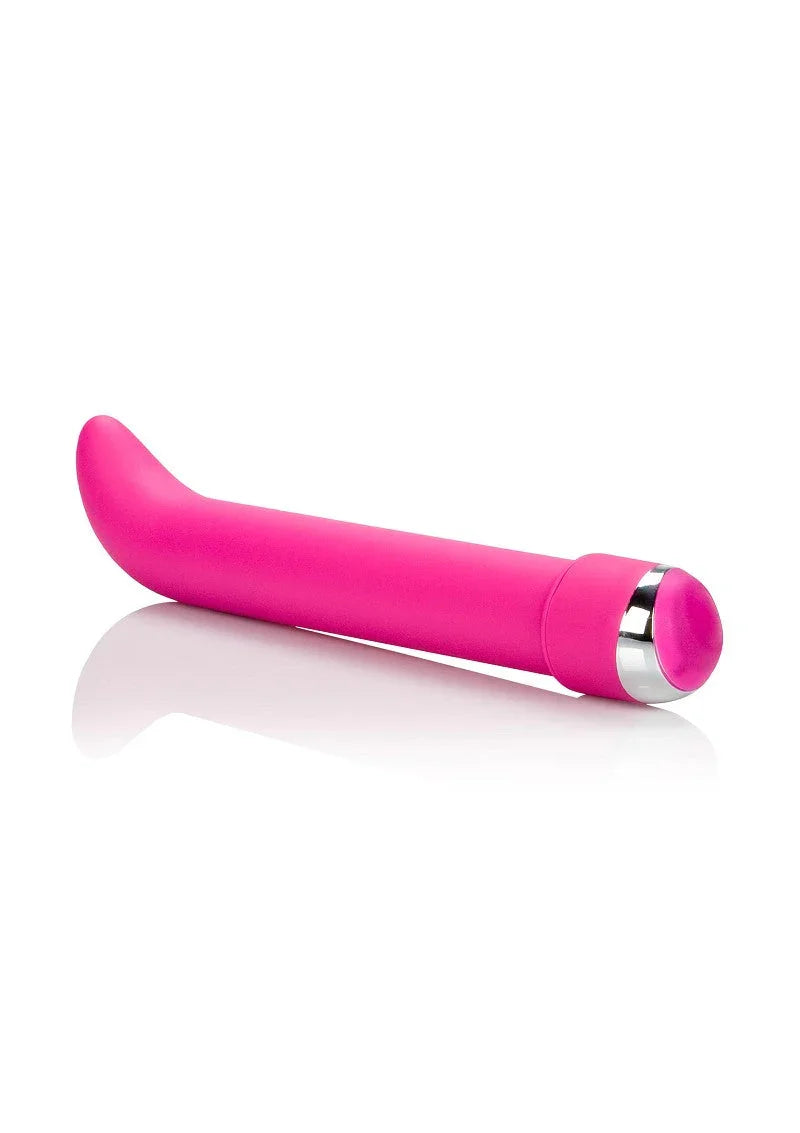 Pink curved G-spot vibrator with silver button on white background