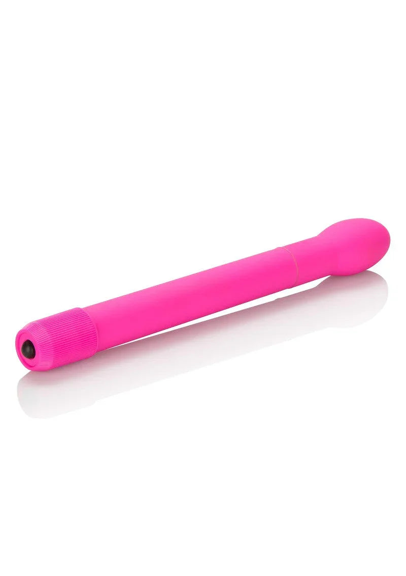 Bright pink slender vibrator with rounded tip and textured base on white background