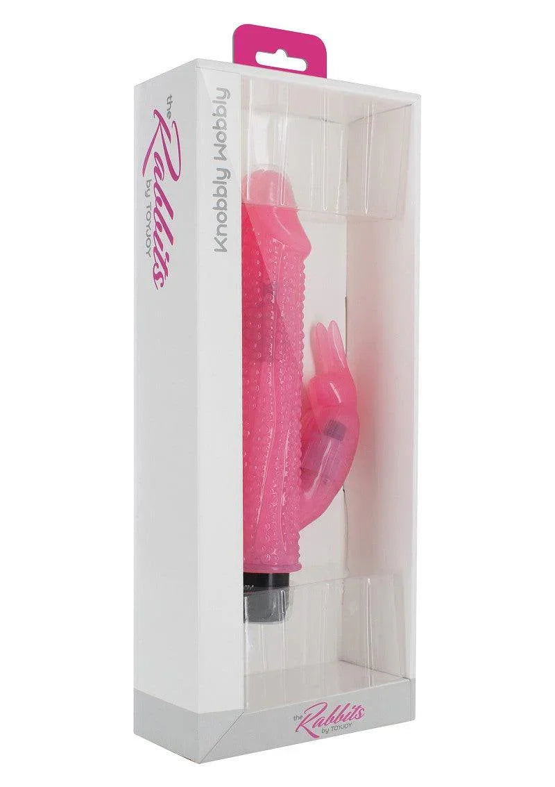 Pink textured Knobbly Wobbly rabbit vibrator in clear white packaging by ToyJoy