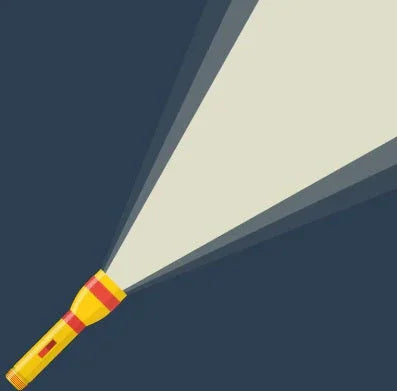 yellow and red flashlight shining beam of light on dark background