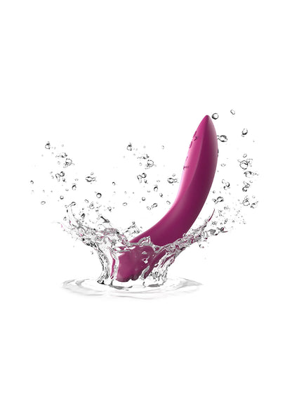 Roze Rave 2 vibrerende dildo met waterdruppels, klaar voor gebruik.