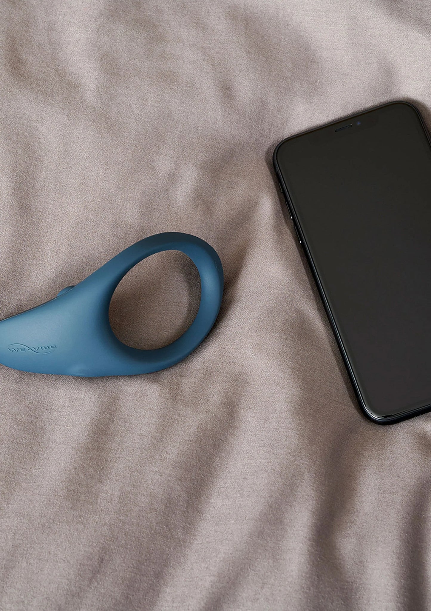 We-Vibe Verge intieme stimulator met handlus, blauwgrijze ring en puntvorm
