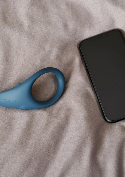 We-Vibe Verge intieme stimulator met handlus, blauwgrijze ring en puntvorm