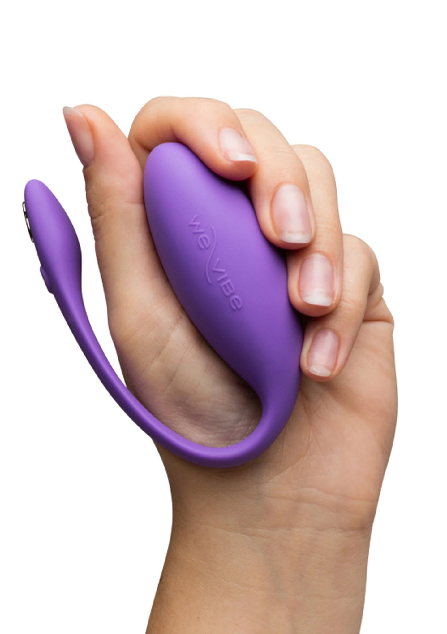 Paarse U-vormige vibrator in hand met afgeronde, zachte kop en beugel