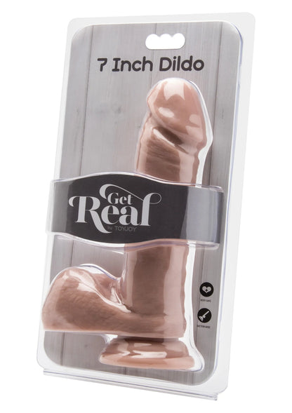 Verpakking met Get Real dildo van ToyJoy, beige variant, glanzende vorm.