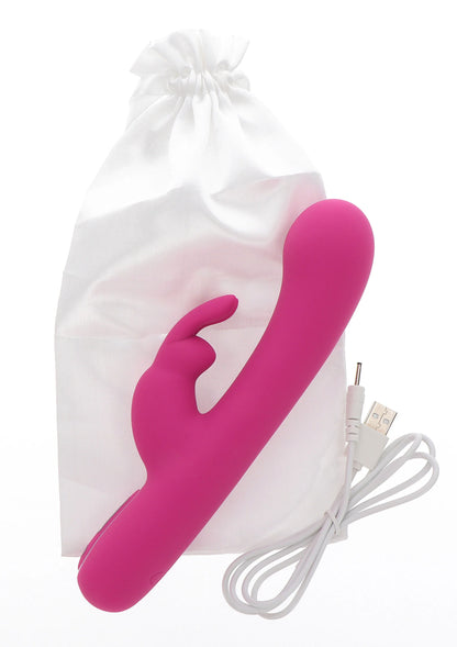 Roze konijn-vibrator met beschermzakje en USB-kabel, product schuin in beeld