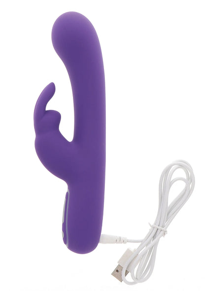 Paarse konijn-vibrator met oortjes en meegeleverde USB-kabel.