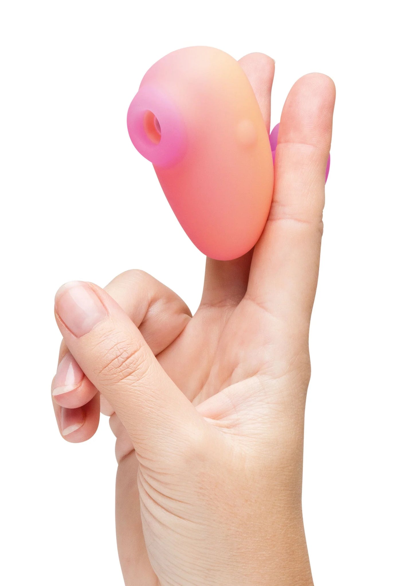 Roze ovale vibrator met paars accent, close-up tussen handen