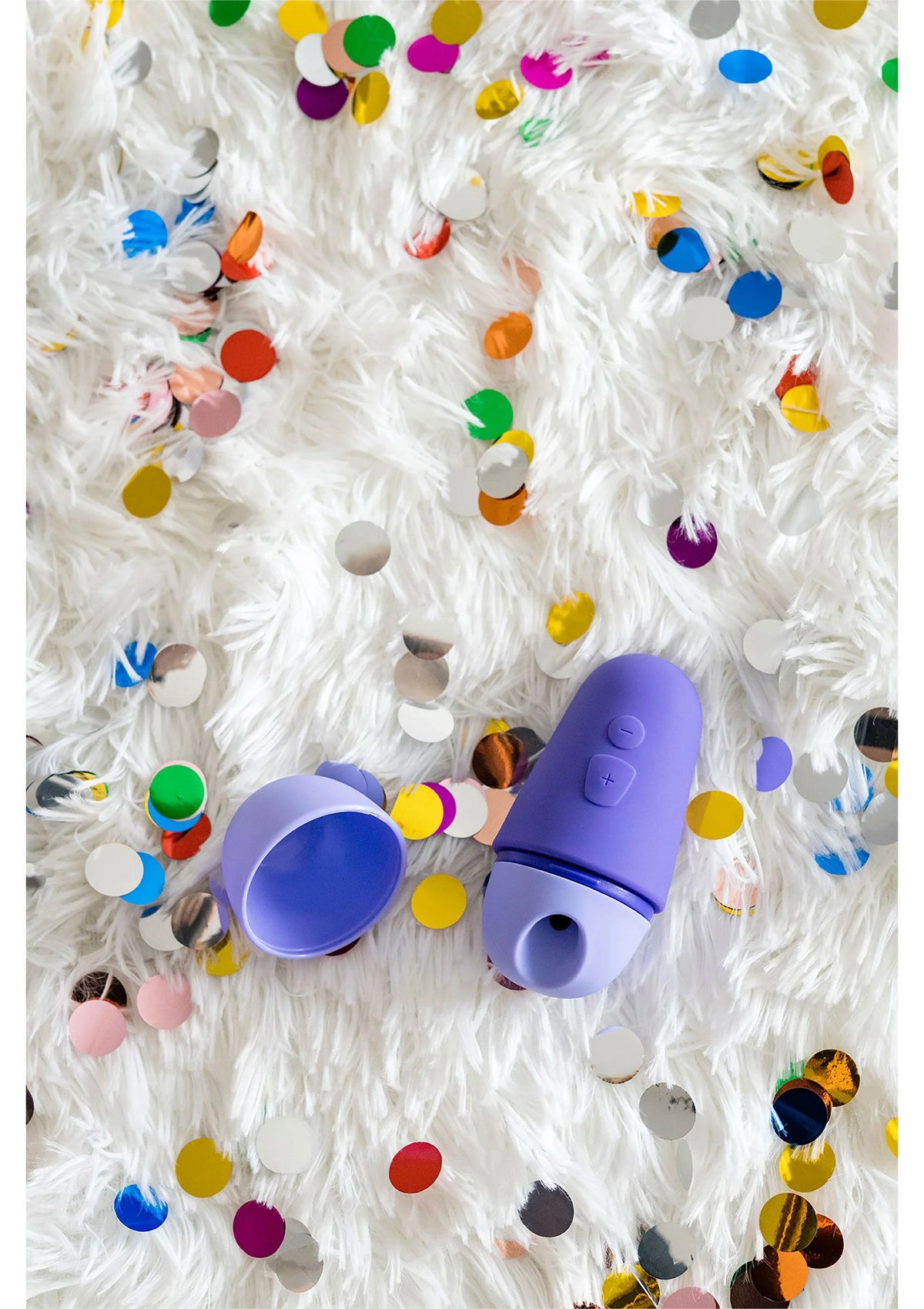 Airpressure vibrator van Romp met paarse handvatten en stimulatiekappen