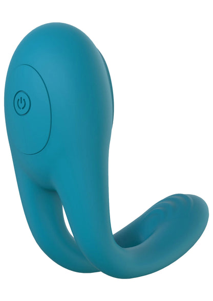 Blauwe ringvormige massager met ronde bedieningsknop aan zijkant.