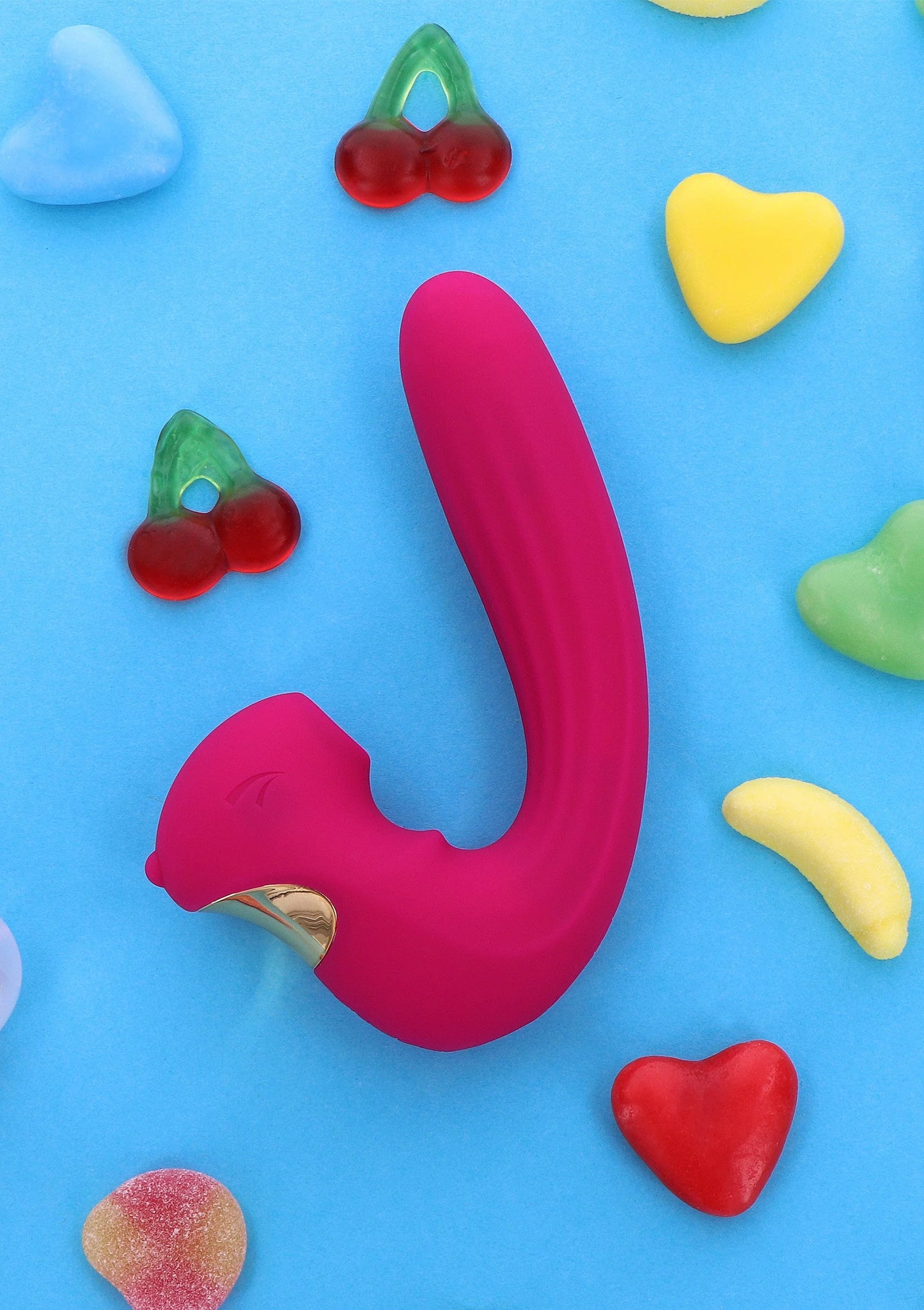 Roze U-vibrator met gouden inzet en gladde siliconen afwerking, bovenaanzicht.
