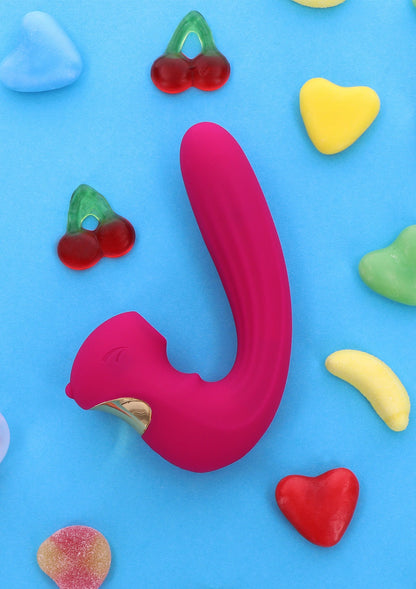 Roze U-vibrator met gouden inzet en gladde siliconen afwerking, bovenaanzicht.