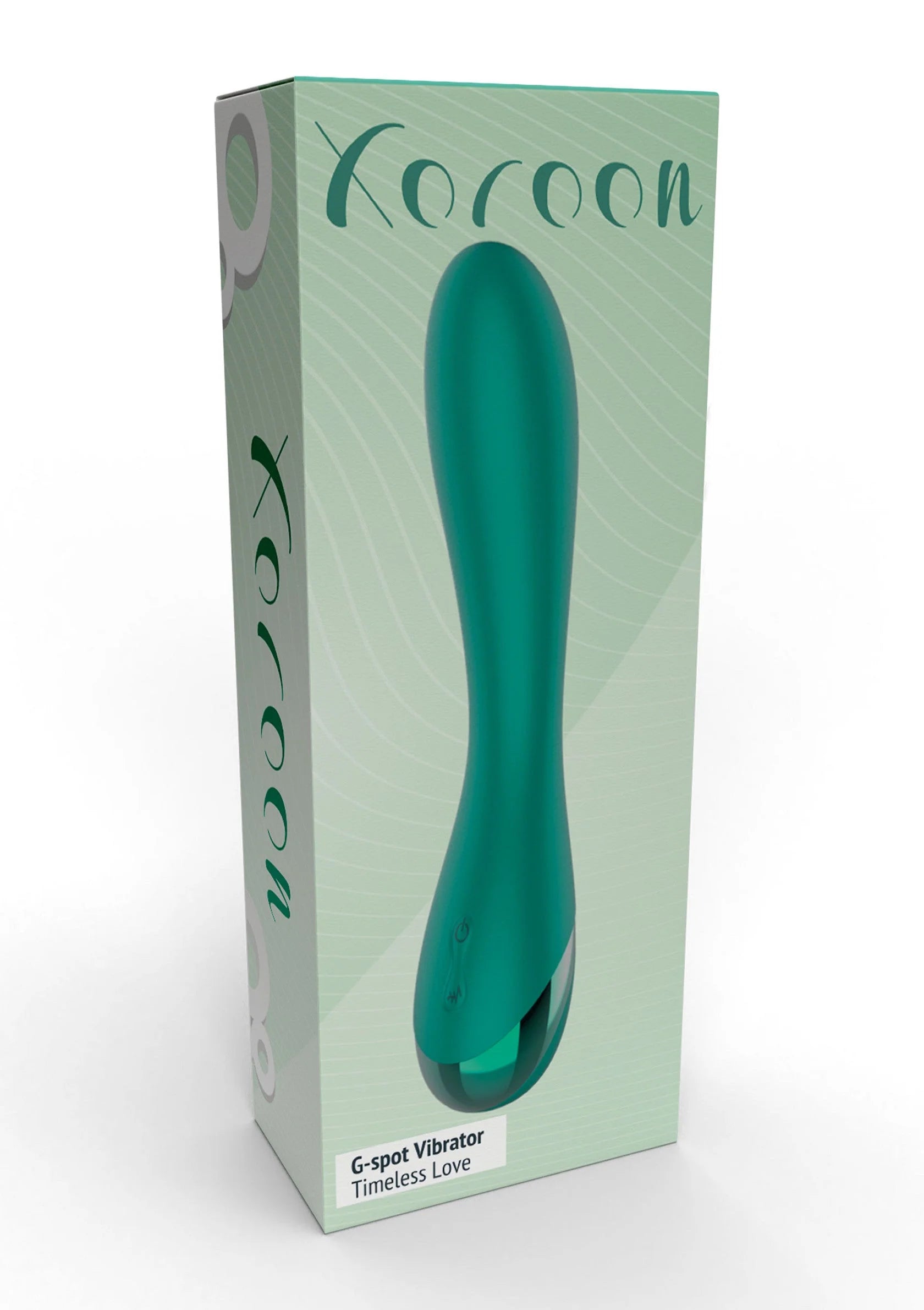Groene Xocoon G-spot vibrator met gebogen vorm, staand op de verpakking