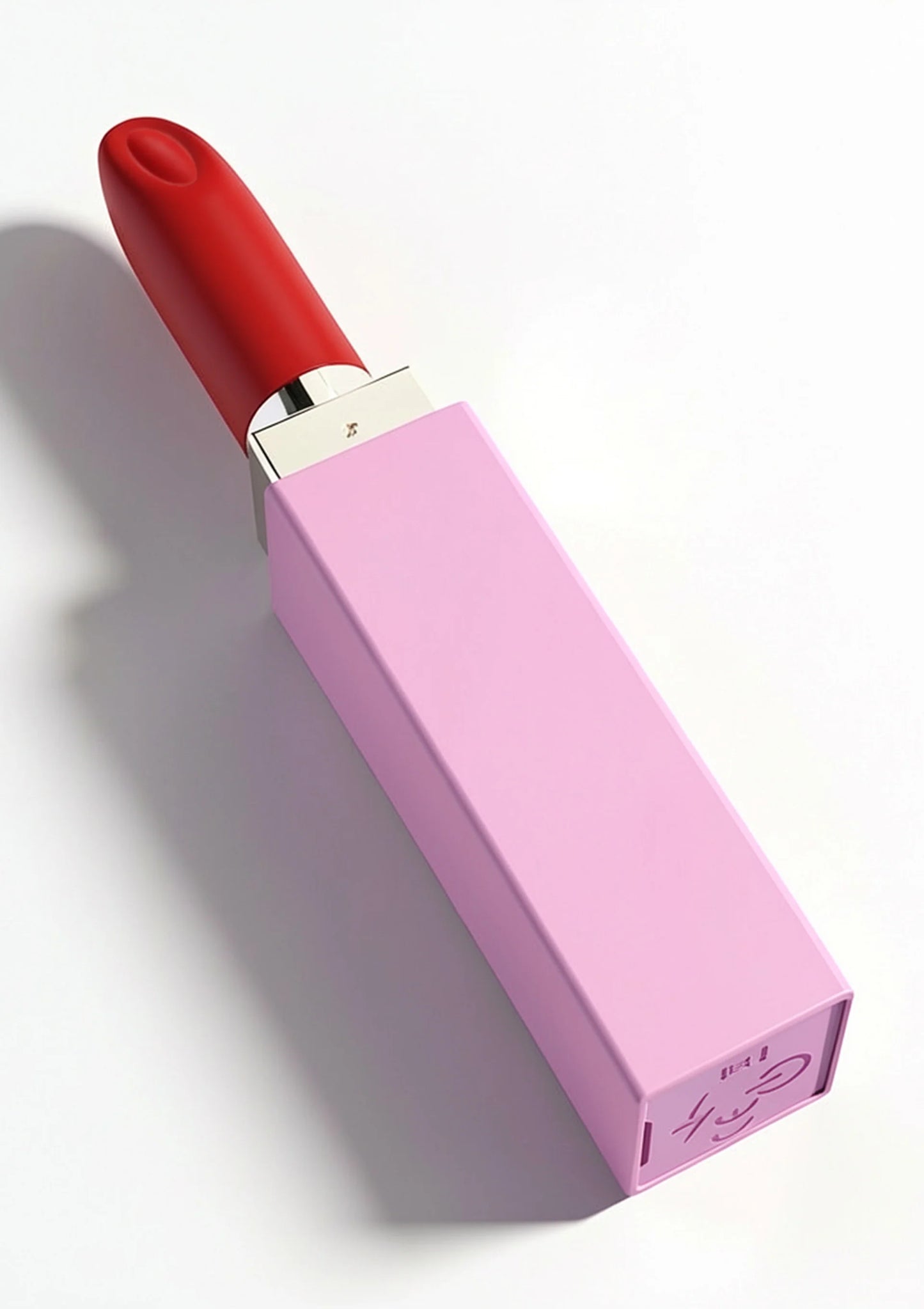 Lipstick-vibrator van Xocoon in roze houder met rood opzetstuk in schuine hoek