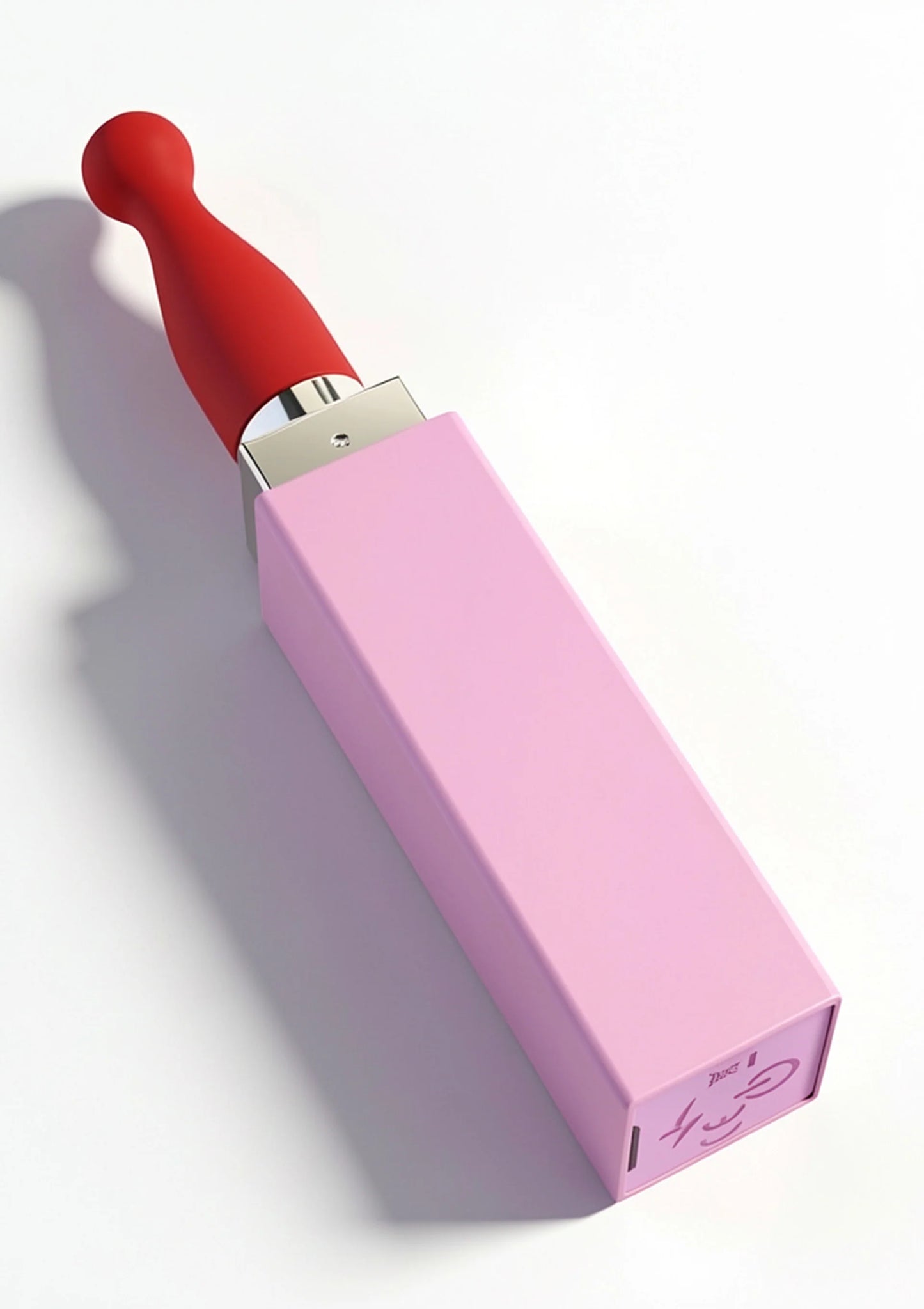 Lipstick-vibrator van Xocoon met rood opzetstuk en roze verpakking in zijaanzicht