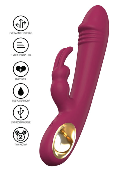 Magenta konijnenvibrator met functie-iconen en gouden ronde opening, staart omhoog.