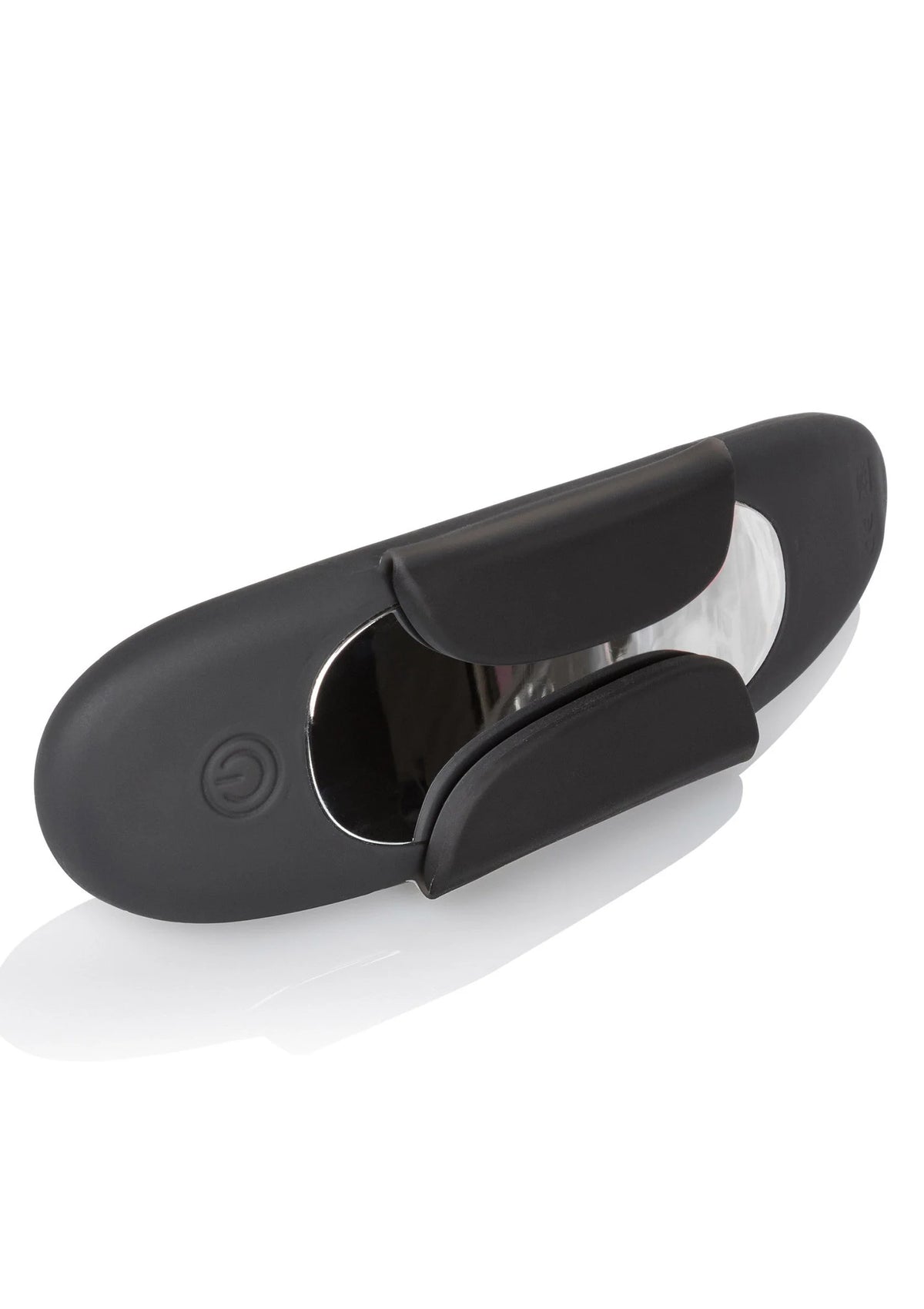 Zwarte panty teaser vibrator met klem, open binnenkant en ovale behuizing.