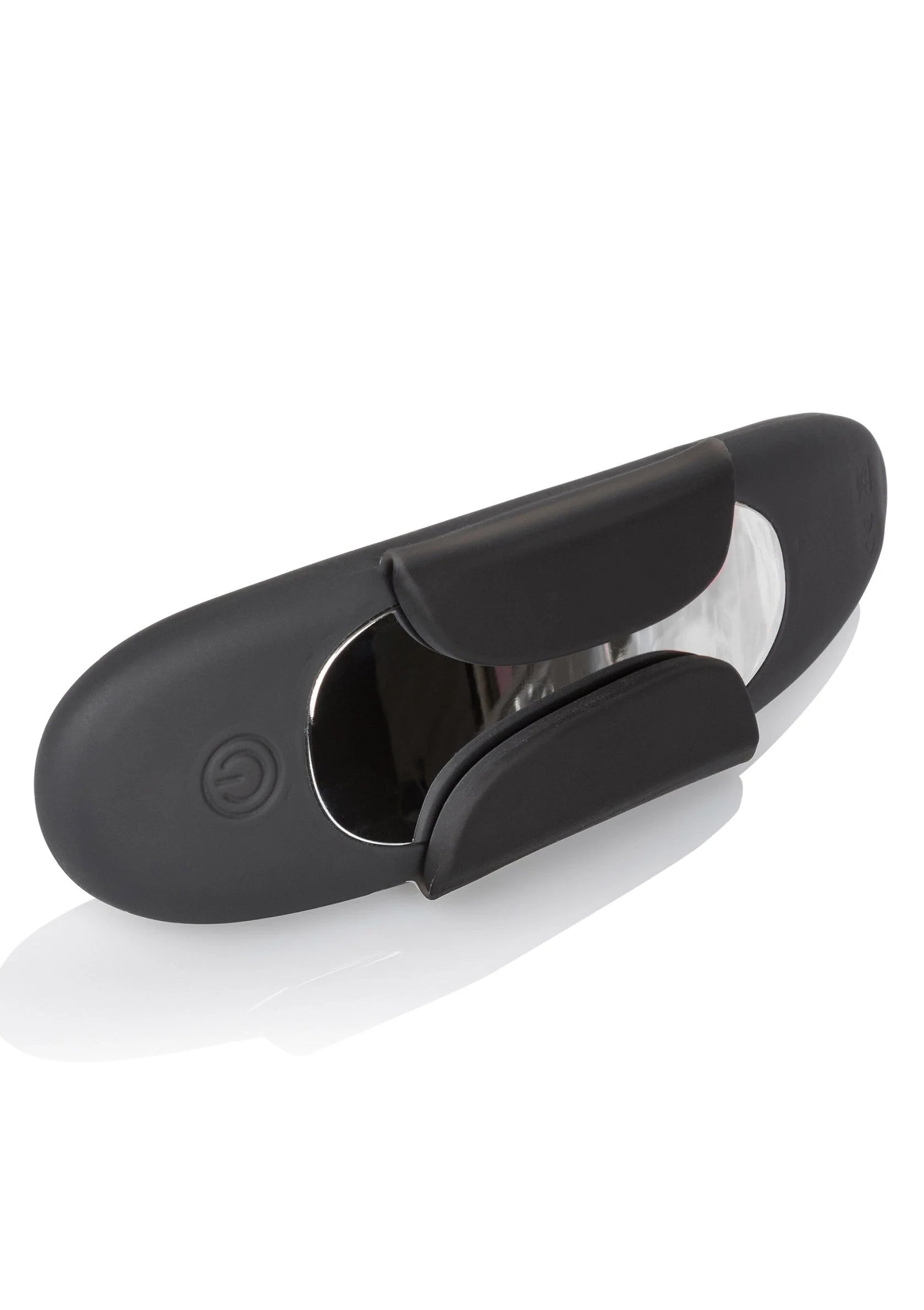 Zwarte panty teaser vibrator met klem, open binnenkant en ovale behuizing.