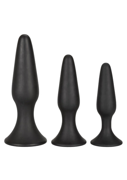 Drie buttpluggen van silicone, donkergrijs, taps bovenkant en brede voet