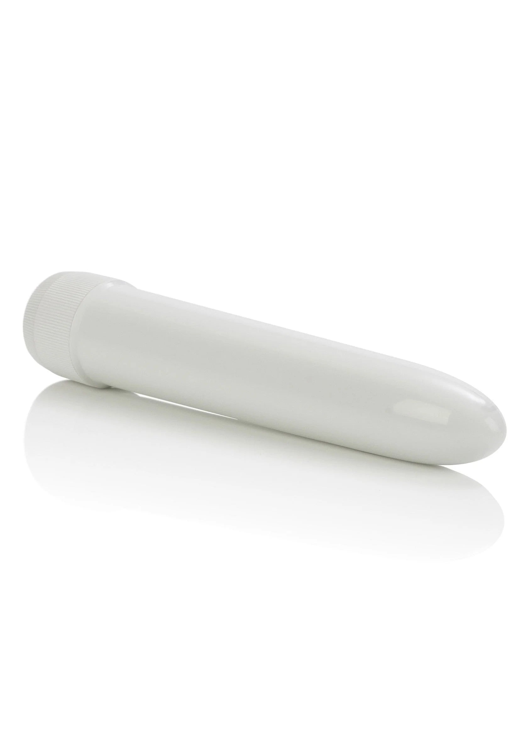 Witte slanke vibrator met afgeronde kop, liggend