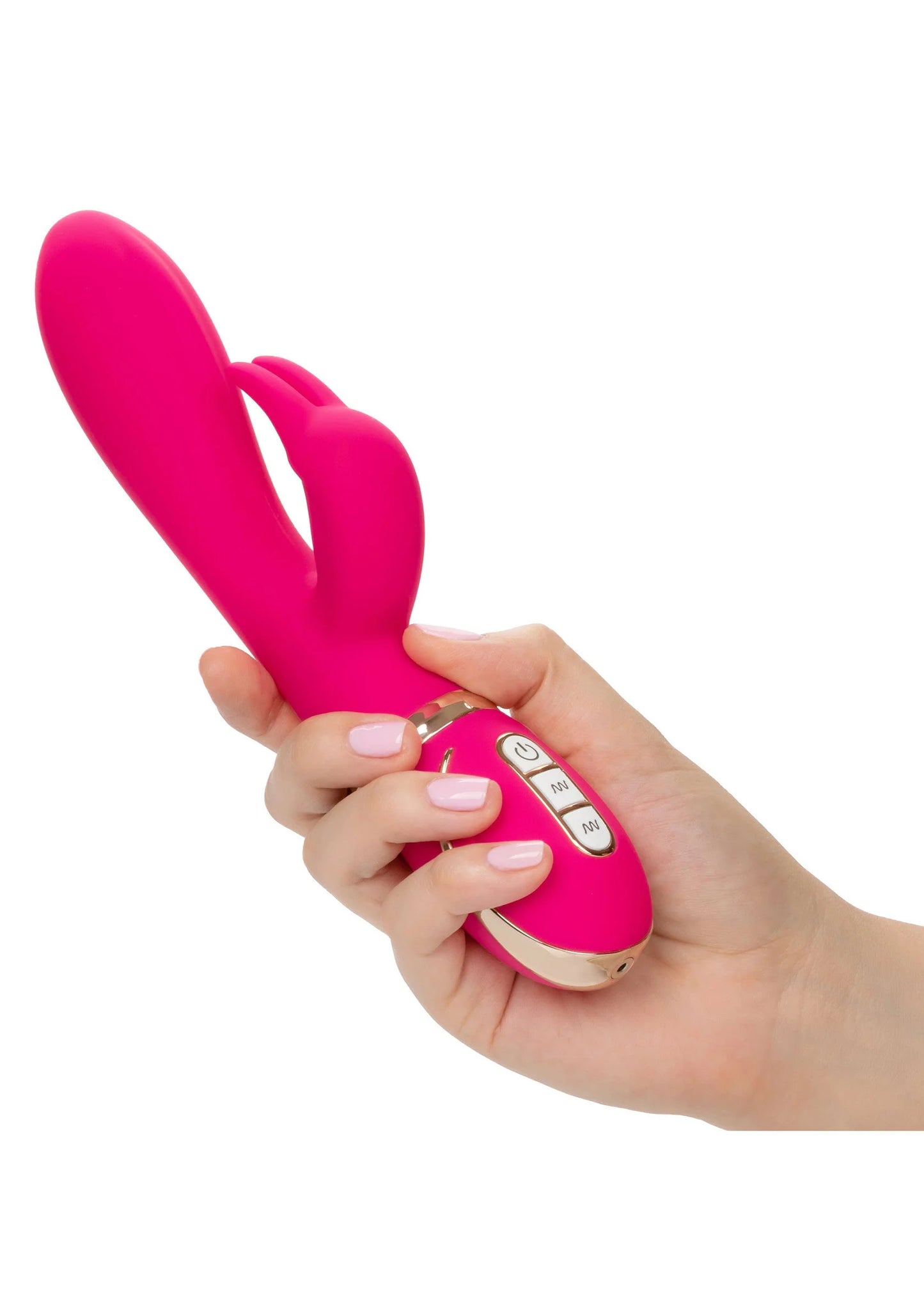 Roze rabbit-vibrator in hand met bedieningspaneel en ronde controller