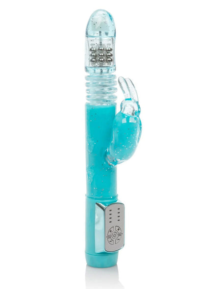 Turquoise vibrator met transparante top en afgeronde onderkant met knoppen.