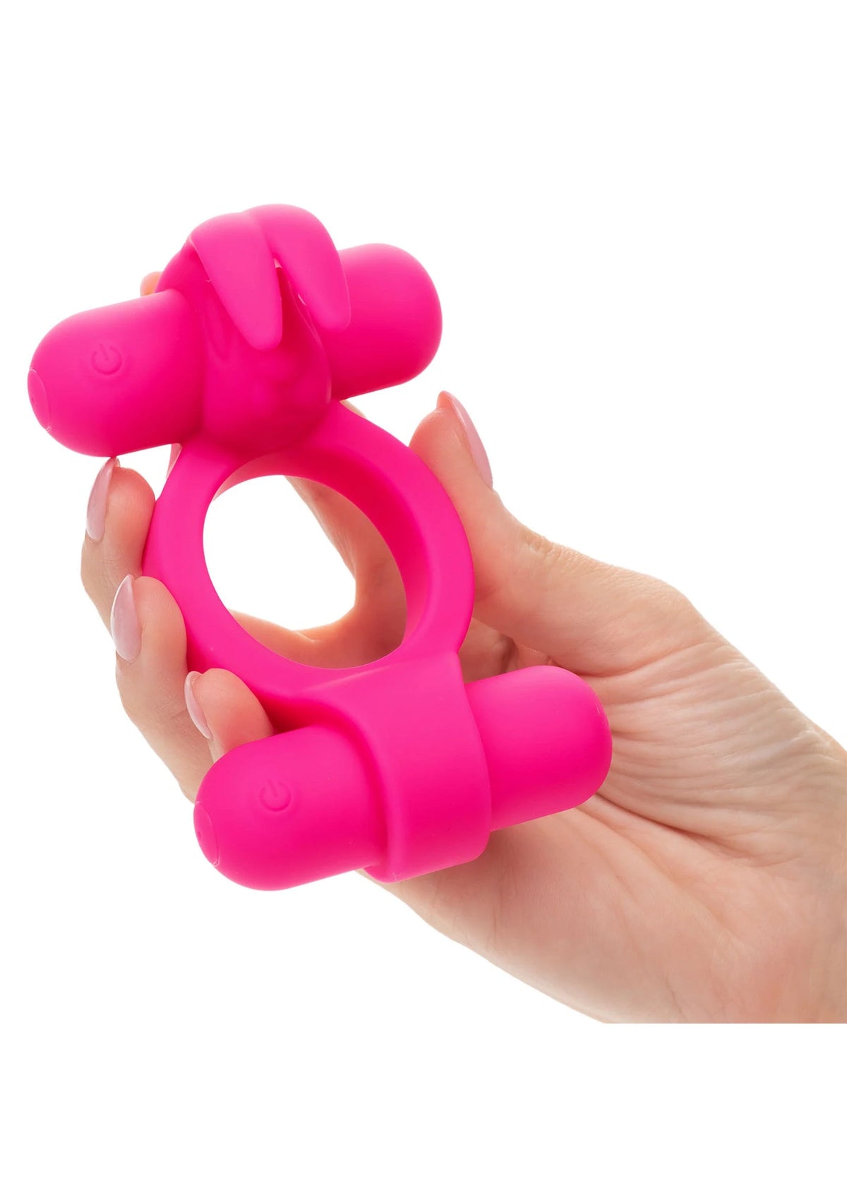 Fuchsia siliconen Rockin Rabbit vibrator in hand, ringgreep zichtbaar
