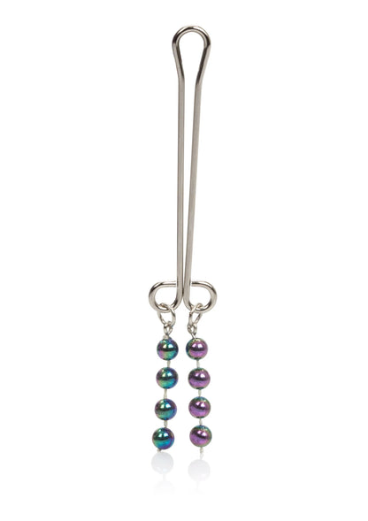 Clitoris piercing-sieraad met U-vormige metalen haak en glanzende kralen in paars en teal