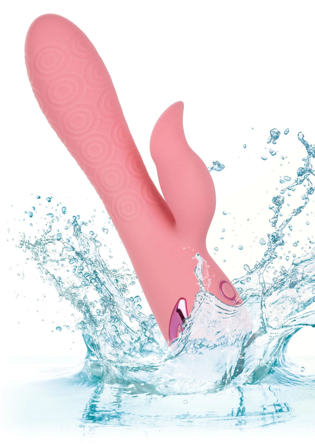 Roze vibrator met reliëfstructuur, met water spetters rond het apparaat