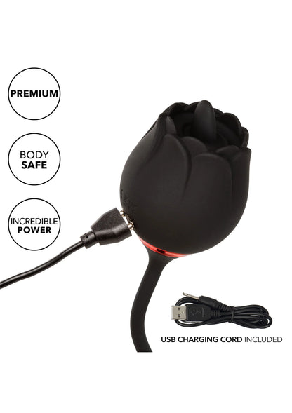 Zwarte vibrator met geveerde bloemenkop en USB-oplaadkabel