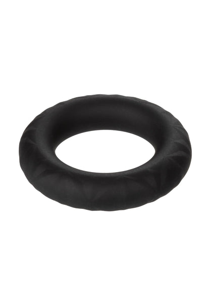 Zwarte cockring met zachte structuur en rond open midden, close-up.
