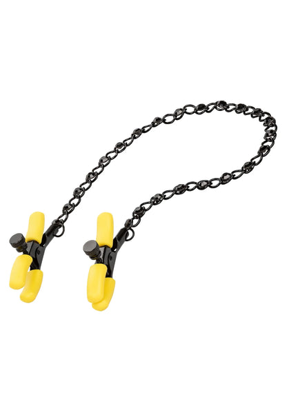 Set borstnippelclips met gele klemmen en zwarte ketting, close-up