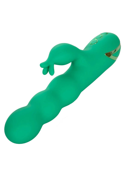 Groen seksspeeltje met ronde kop en gegraveerd/bedekt ornament op de top