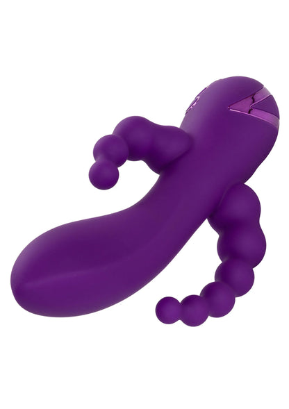 Paarse vibrator met bolle knoppen langs de zijkant en detail aan de kop
