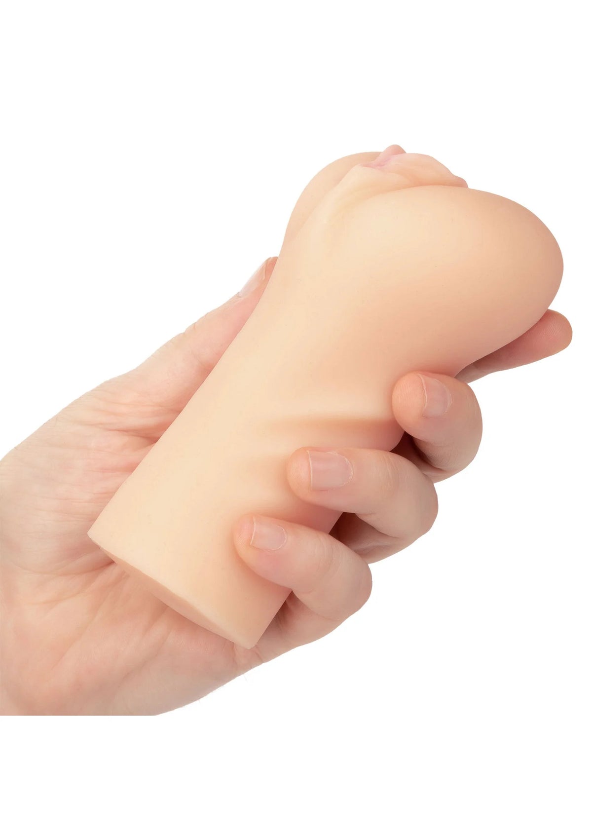 Huidkleurige masturbator vastgehouden in de hand, met open uiteinde