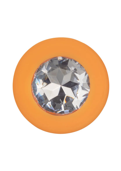 Oranje anale plug met ronde kristal-inzet en gladde siliconen afwerking.