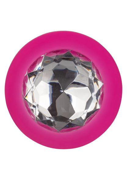 Close-up: roze ring met grote ingelegde glazen steen