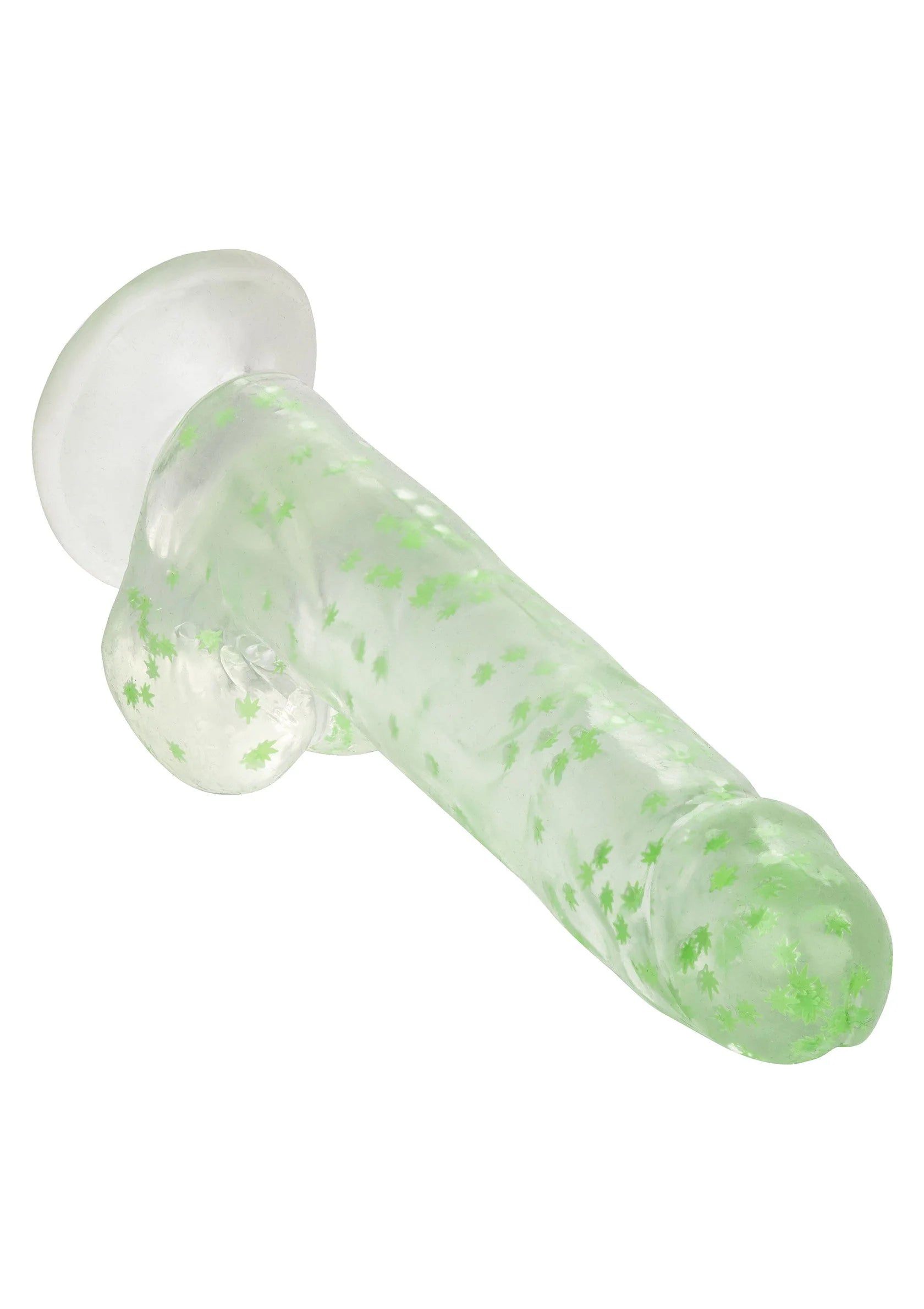 Zijaanzicht van glow-in-the-dark dildo met weed- of bladcirkels en zuignapbasis