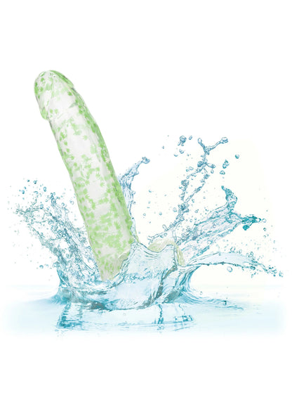 Glow-in-the-dark dildo met weed- of bladcirkels, met waterspatten rond de steel