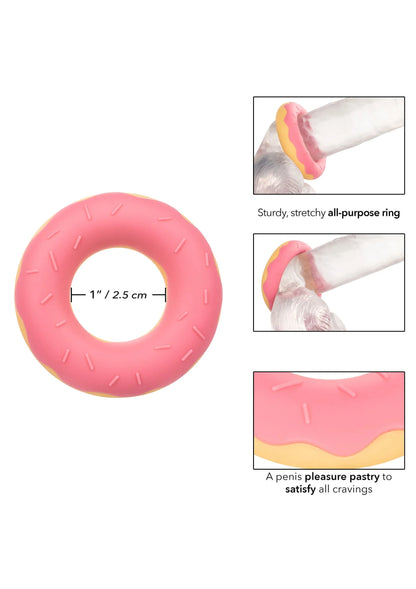 Roze siliconen donut-cockring met gele rand, maatindicatie 2,5 cm