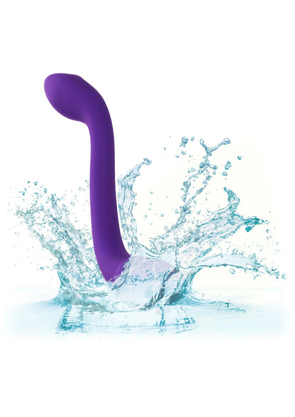 Paarse U-vorm vibrator met waterdruppels, staand in profiel