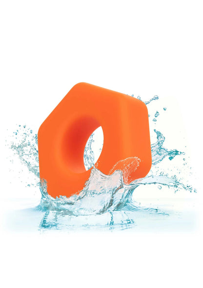 Oranje vloeibare siliconen seksagonring met waterdruppels