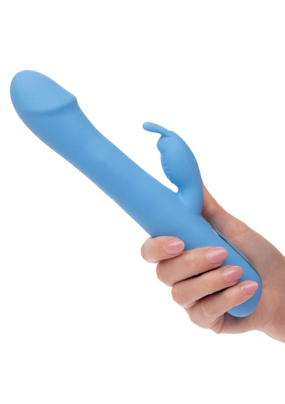 blauwe konijnvibrator vastgehouden in hand, met ronde kop