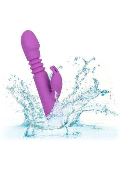 Paarse jackrabbit-vibrator met opwaaiende waterspatten rond de kop