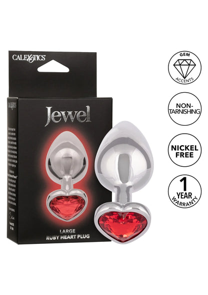 Jewel anale plug met grote rode hartvormige steen en glanzende metalen punt.