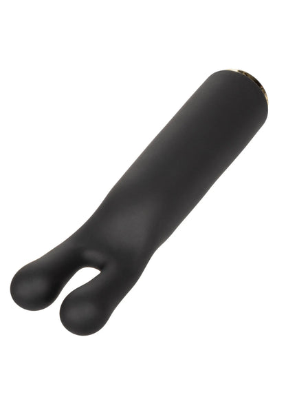 Zwarte V-vormige massager/vibrator in zijaanzicht met ronde openingen