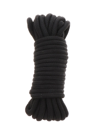 Bondagekoord van Hidden Desire, zwart opgerold met geknoopte uiteinden